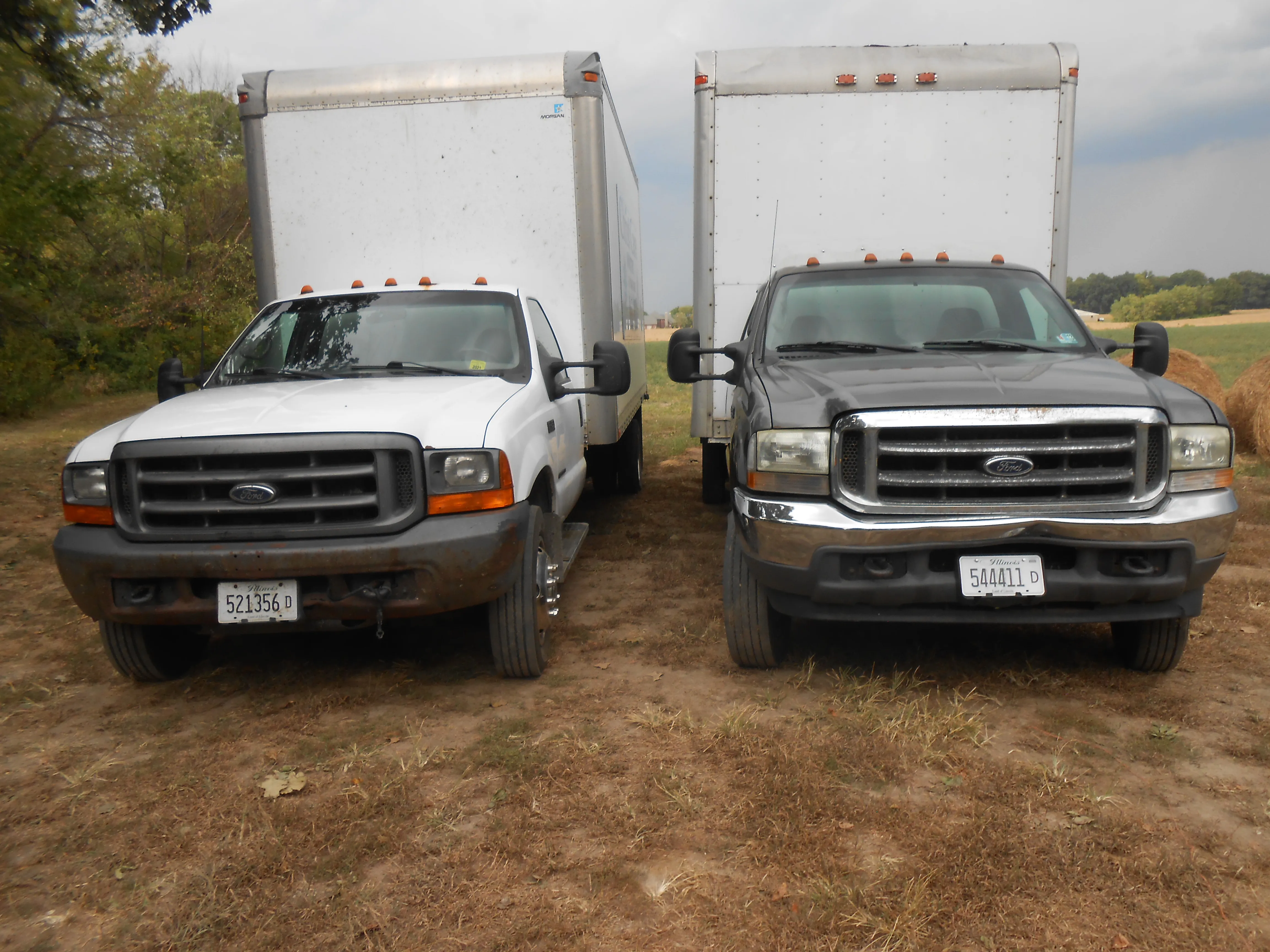 Two delivery trucks ready for service - Front view of our fleet